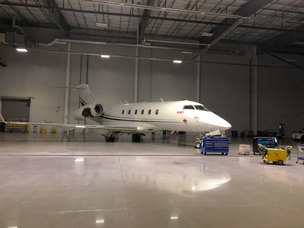 Aircraft in Hangar for movie production in Calgary. Private Jet Rental.
